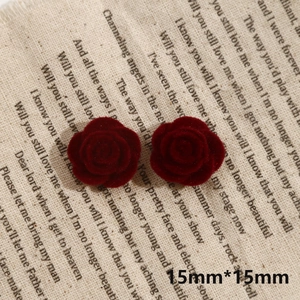 Detail of 15mm dark red velvet rose charms with realistic 3D petals for jewelry making
