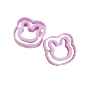 Set of two purple rabbit and bear shape plastic molds for baking and clay crafts
