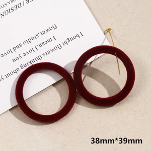 Close-up of burgundy velvet round earrings with gold hooks, size 38mm x 39mm