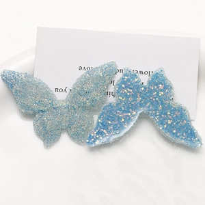 Pair of blue resin butterfly charms with glitter sequins and micro beads for DIY jewelry