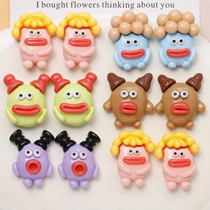 Close-up of cute mushroom-head resin charms in five colors for DIY jewelry crafts
