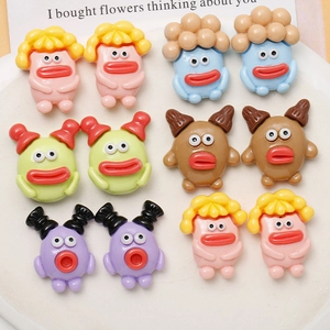 Detailed close-up of funny mushroom head resin charms with big lips for DIY hair clips