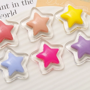 Macro detail of glossy colorful resin double five-pointed star DIY jewelry accessories