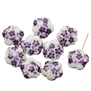 Handcrafted ceramic flower beads with purple floral patterns for DIY jewelry making