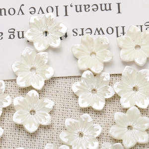 Pearlescent white resin flower charms with center holes for DIY jewelry making