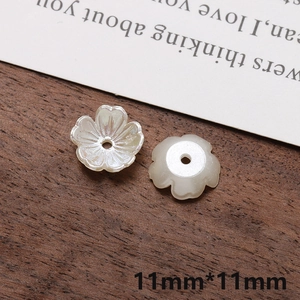 Detail view of 11mm gradient pearl white flower acrylic beads for DIY jewelry making