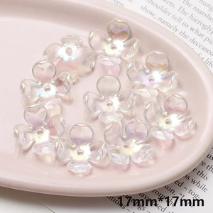 Macro view of 17mm iridescent acrylic camellia flower beads for DIY jewelry making