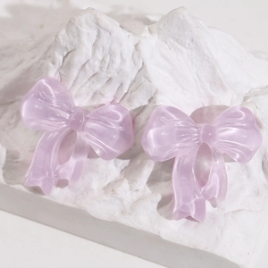 Elegant translucent light purple resin bow earrings with a cat-eye velvet finish