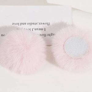 Close-up of pink 50mm faux rabbit fur balls with white flat base for DIY hair accessories