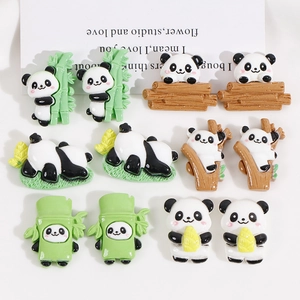 Detailed view of 12 cute resin panda flatback charms for DIY hair clip accessories