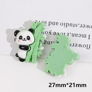 Detail view of 27x21mm resin panda with green bamboo DIY charm for hair clips and crafts