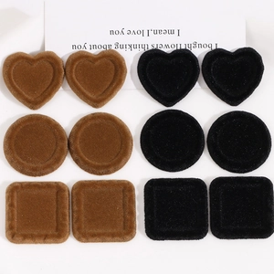 Detailed view of 12-piece flocked resin DIY charms in heart, round and square shapes