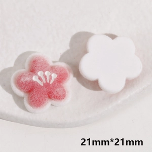 Macro shot of 21mm red velvet flocked flower resin charms for DIY jewelry making accessories