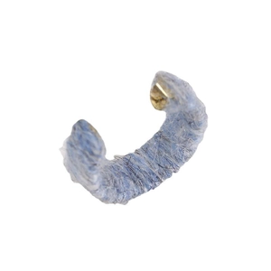 Minimalist C-shape earrings wrapped in light blue and grey knit plush over gold base