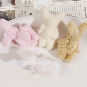 Détails de breloques lapins en peluche douce en quatre couleurs avec nœuds en satin