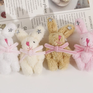Lot de 4 breloques lapins en peluche avec nœuds en velours et paillettes d'étoiles