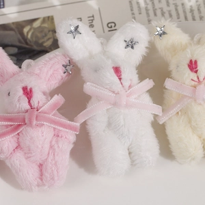 Détails de breloques lapins en peluche avec nœuds en velours et étoiles argentées