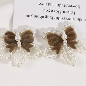 Handmade brown velvet bow hair clips with faux pearl trim and floral accents set