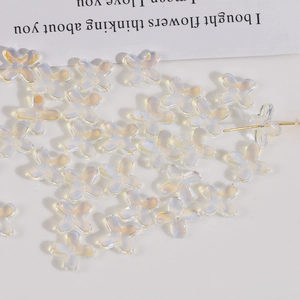 Macro view of gradient rainbow glass flower beads for DIY jewelry and hair accessories