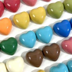 Vibrant multi-colored glossy resin heart-shaped charms for DIY jewelry and crafts