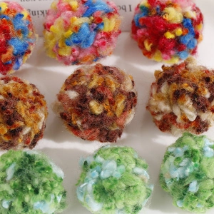 Detailed view of colorful 30mm fluffy plush yarn balls for DIY jewelry and crafts