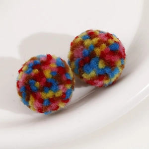 Macro shot of 30mm colorful fluffy plush pom-pom balls for DIY jewelry accessories