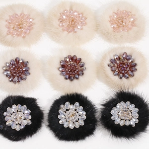 Detailed view of handmade plush base with crystal bead flower patch for DIY jewelry