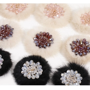 Detail of handmade plush flower charms with sparkling crystal beads for DIY accessories