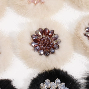 Detail of plush flower patches with handmade crystal beads for DIY jewelry making