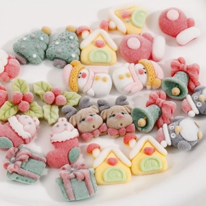 Assorted flocked Christmas resin charms including reindeer and trees for DIY crafts