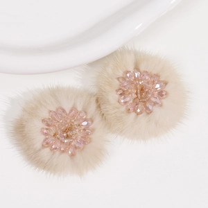 Winter plush floral hair accessory with pink crystal beads in cream faux fur texture