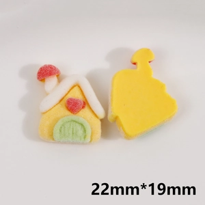Detail of yellow flocked miniature house charm measuring 22mm by 19mm for DIY crafts