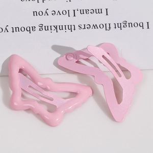 Set di fermagli per capelli a farfalla rosa in metallo con finiture lucide e opache