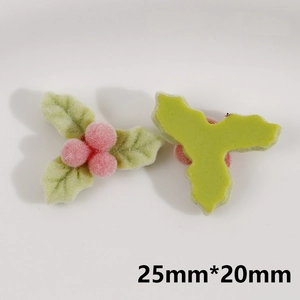 Detailed view of pink flocked holly berries and green leaves for DIY Christmas crafts