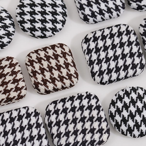 Classic houndstooth fabric buttons in round and square shapes for DIY sewing projects