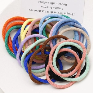Close-up of colorful high-elastic hair ties with ribbed texture and smooth buckles