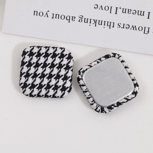 Square black and white houndstooth fabric buttons with smooth metal backing for DIY crafts