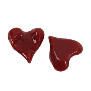 Irregular dark red heart resin charms for DIY jewelry making on white background