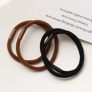 Three-piece high elasticity hair ties set in brown and black with ribbed texture