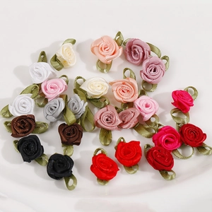 Colorful handmade satin ribbon roses with green leaves for DIY sewing and hair accessories