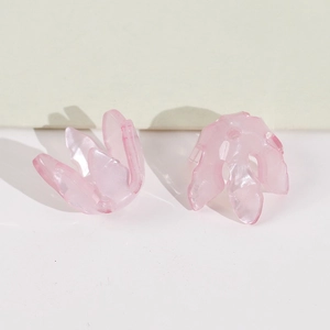 Two light pink translucent resin flower pendants for DIY jewelry and hair accessories