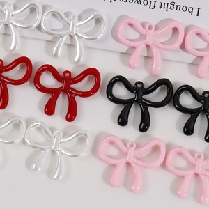 DIY bow-shaped pendant accessories in white, pink, red, and black with polished finish