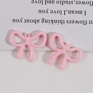 Pink bow-shaped jewelry pendants with hanging holes for DIY necklaces and earrings