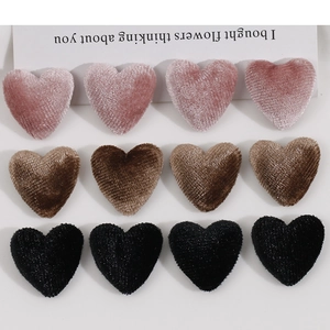 Set of 12 velvet heart-shaped patches in pink, brown, and black for DIY craft projects