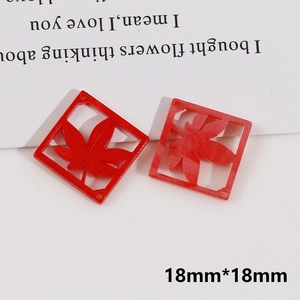Macro shot of 18mm red resin square hollow pendant with maple leaf for DIY jewelry