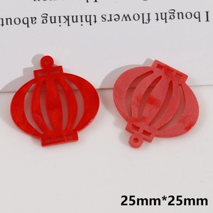 Detail of 25mm red lantern resin charms with glitter and marble texture for DIY jewelry