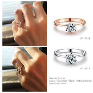 Detailed view of 6mm six-prong cubic zirconia ring in rose gold and platinum plating