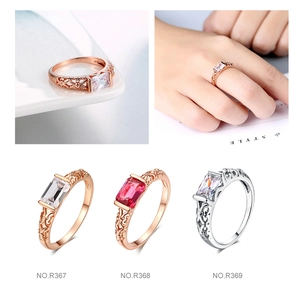 Detail showing vintage rose gold rings with rectangular zircon and hollow patterns