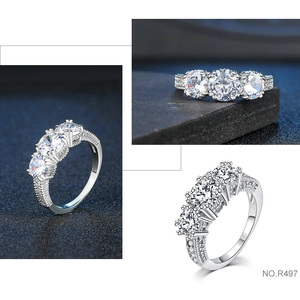 Elegant silver open ring with three large round zircons and pave set accents