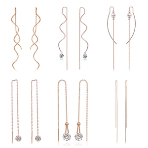Orecchini a spirale in oro rosa e pendenti lunghi con perle e pietre di zircone cubico